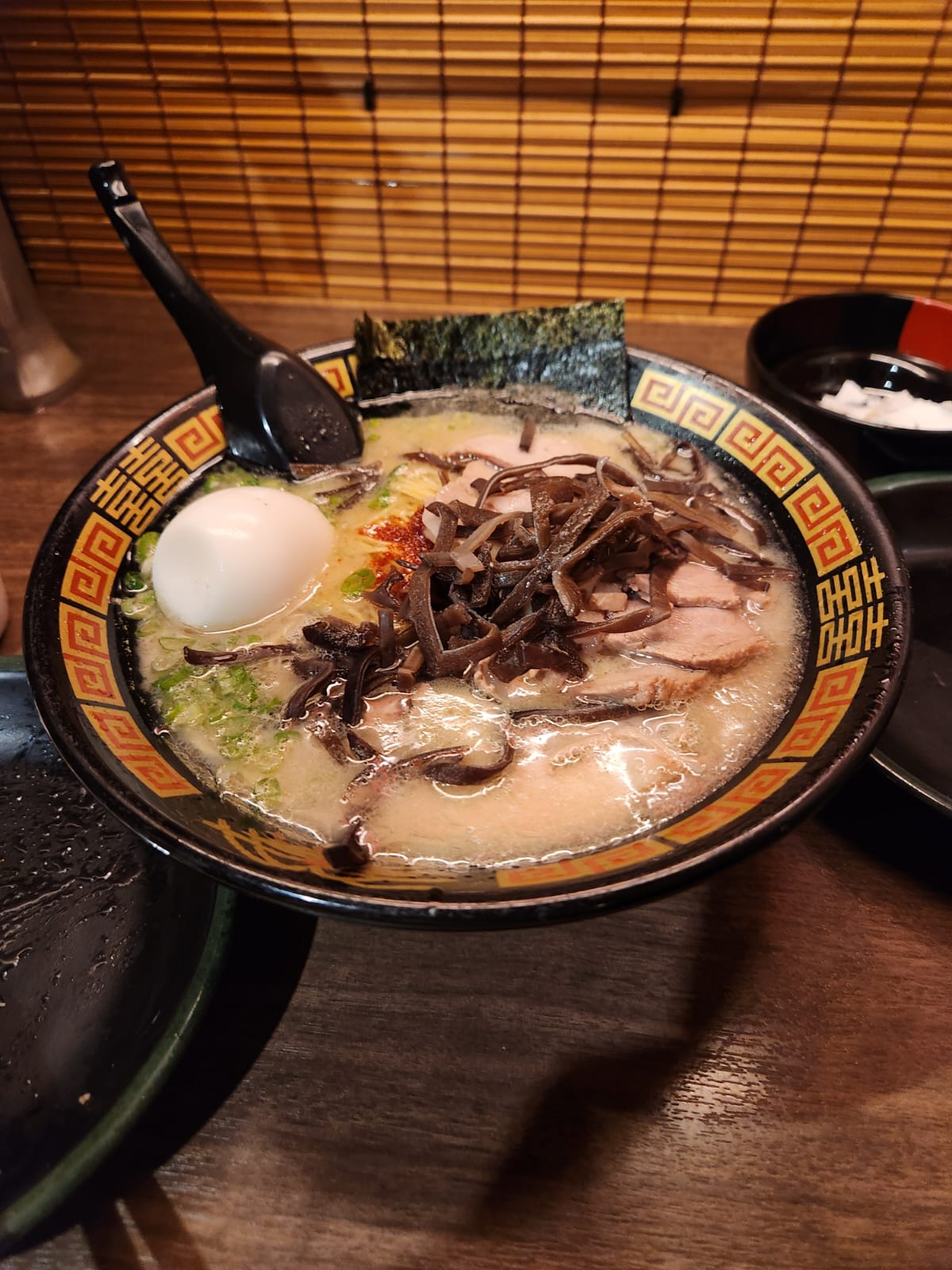 A bowl of tonkotsu ramen with chashu and egg